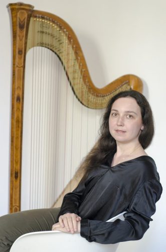 Portrait of harpist Ionella Marinutsa, portrait orientation